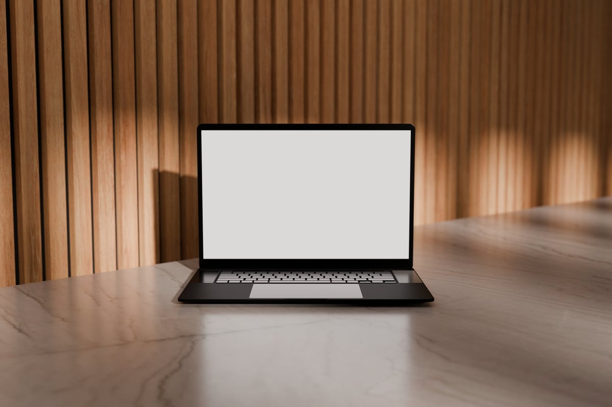 Premium laptop showing website mockup — Optnx authority websites and landing pages